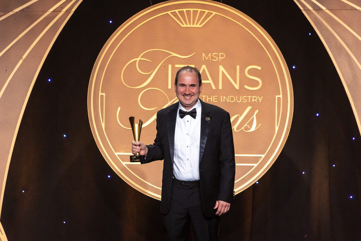 Rene receiving MSP Titans award